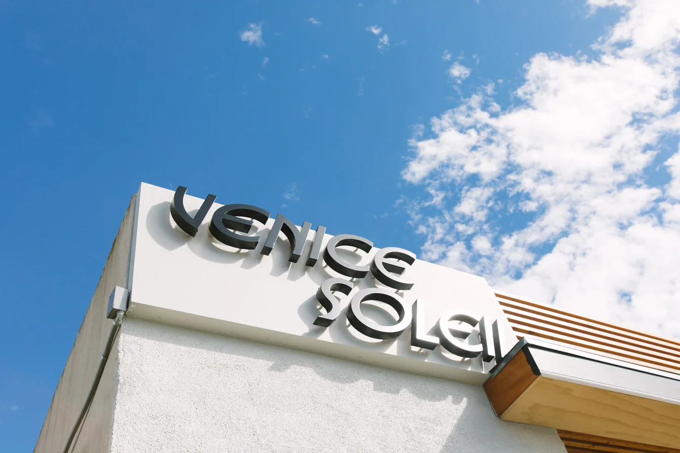The Venice Soleil sign at our Pacific Avenue storefront